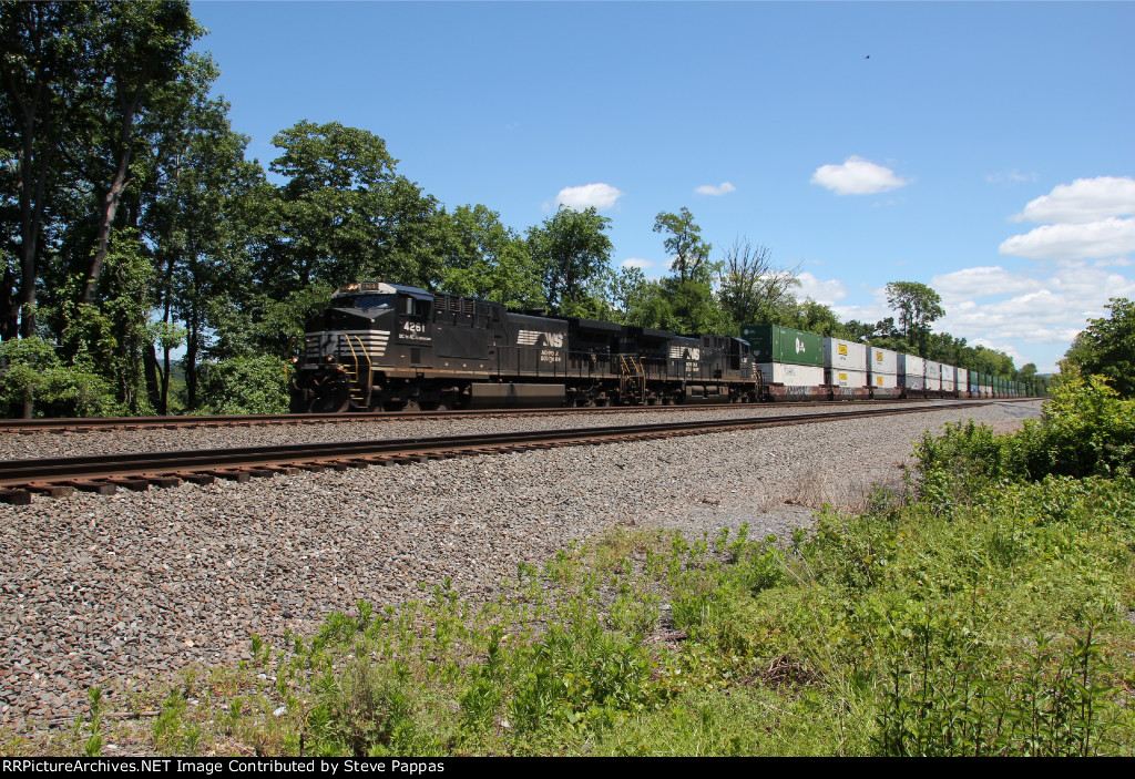 NS 4261 and 4347 take train 25P west at Cove PA